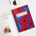 Red poppies hand drawn design notebook on tabletop
